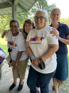 CLS staff members; paralegal Lili Smack, social worker Patty McGlone, paralegal Esther Alvarez, and attorney Pam Walz do some team building.